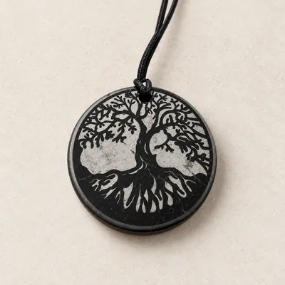 Pendente tondo in shungite con l’Albero della Vita inciso